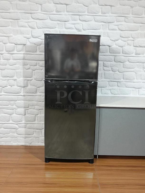 Magic Chef 7.3 cu. ft. 2-door black mini fridge with freezer, good condition, 115v, tested and working.