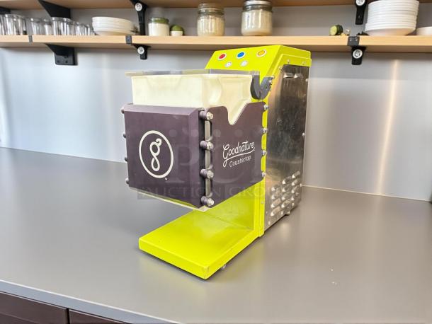 Goodnature CT-7 Commercial Cold Press Juicer, used, tested, working, 115v. Bright yellow-green finish, countertop model.