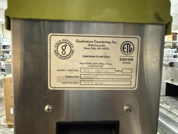 Goodnature CT-7 commercial cold press juicer with label showing model, serial numbers, and manufacturing details. Tested and working.