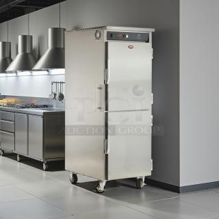 FWE UHST-13-OTB 13 Tray Heated Meal Delivery Cart in excellent condition, with stainless steel finish and caster wheels.