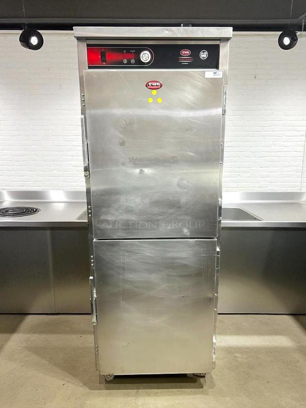 FWE UHST-13-OTB 13 Tray Heated Meal Delivery Cart, 120v, stainless steel, tested, working condition, visible FWE logo.