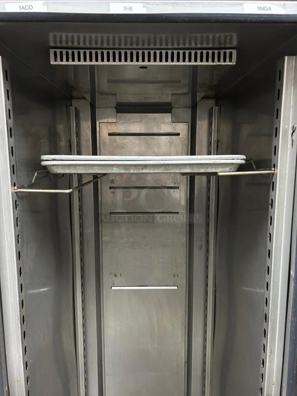 FWE UHST-13-OTB heated meal delivery cart, 13 trays, stainless steel interior, labeled sections, excellent condition, 120v.