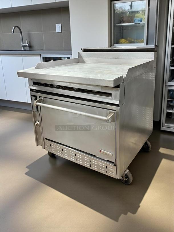 Jade Range JTRH-36G-36C gas range with 36" griddle, convection oven, manual controls, 135,000 BTU, tested and working.
