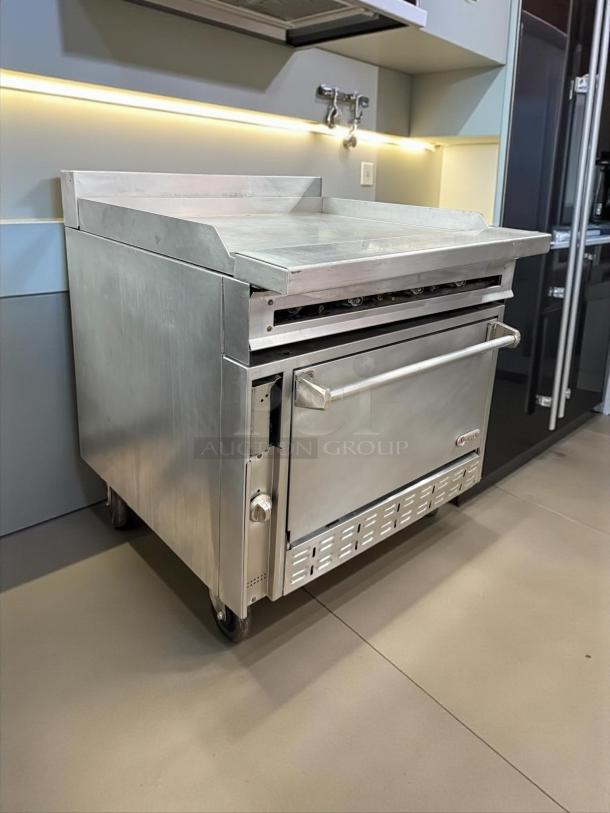 Jade JTRH-36G-36C 36" gas range with full griddle, manual controls, convection oven, 135,000 BTU, in excellent condition.