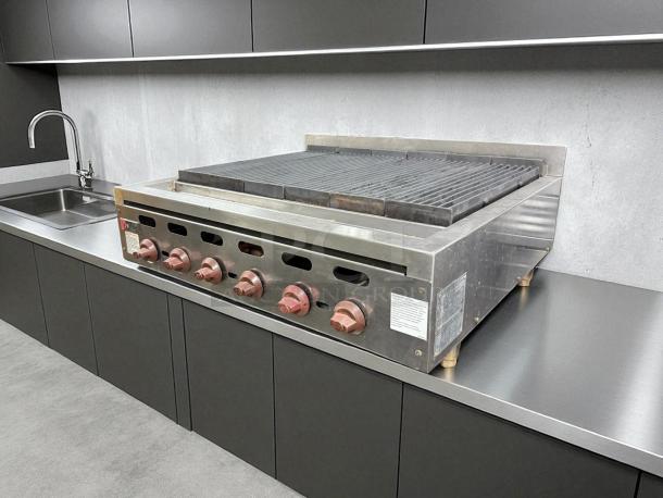 Wolf ACB36 36" gas charbroiler with 6 burners, cast iron grates, natural gas, tested and working, stainless steel finish.