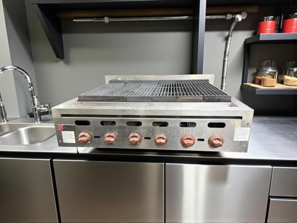 Wolf ACB36 36" Gas Charbroiler with 6 burners, cast iron grates, natural gas. Tested, working, stainless steel, front knobs.