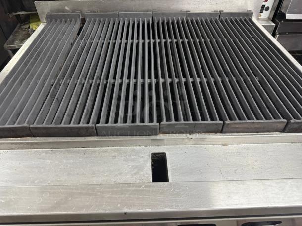 Wolf ACB36 36" gas charbroiler with 6 burners, cast iron grates; natural gas, tested and working condition.