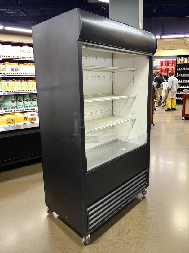 True TAC-48 Vertical Air Curtain Display, 34 Cu. Ft., black, great condition, tested and working with adjustable shelves.