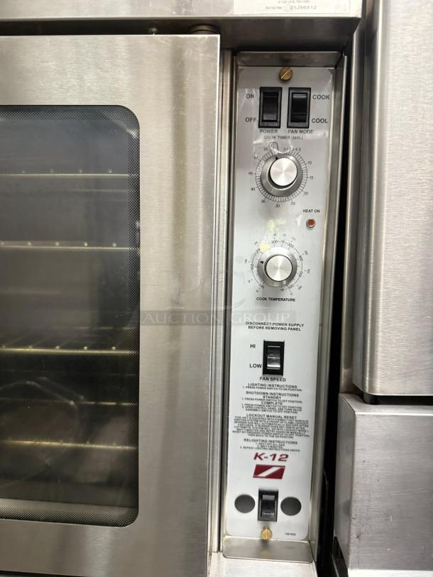 Southbend PCE22S/TD gas convection oven control panel, pristine condition, with visible dials and switches for temperature.