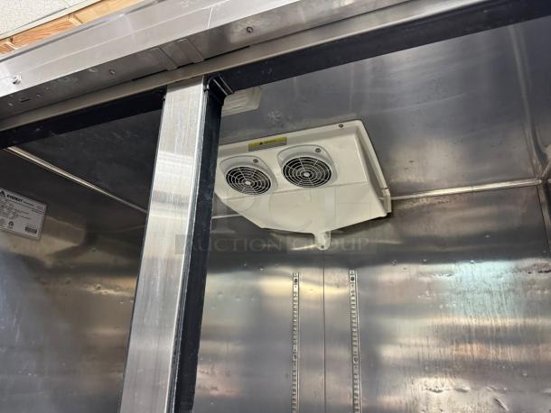 Everest EBR2 two-door reach-in refrigerator interior. Visible fan unit and stainless steel walls. Great condition. NSF tested.