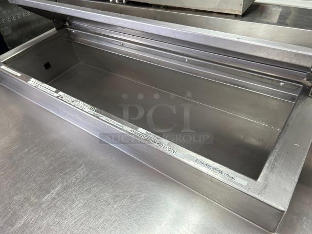 Delfield 000-20191PTC 91" 3-door refrigerated pizza prep on casters; great condition, tested & working; stainless steel.