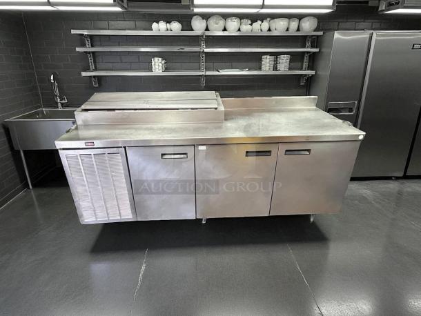 Delfield 000-20191PTC 91in 3-door refrigerated pizza prep on casters, stainless steel, great condition, tested & working.