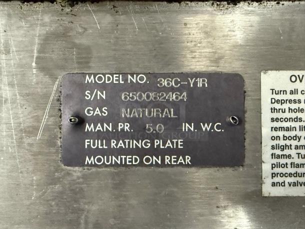 Wolf 36C-Y1R Challenger XL gas range label showing model number, serial number 650082464, and natural gas specs.