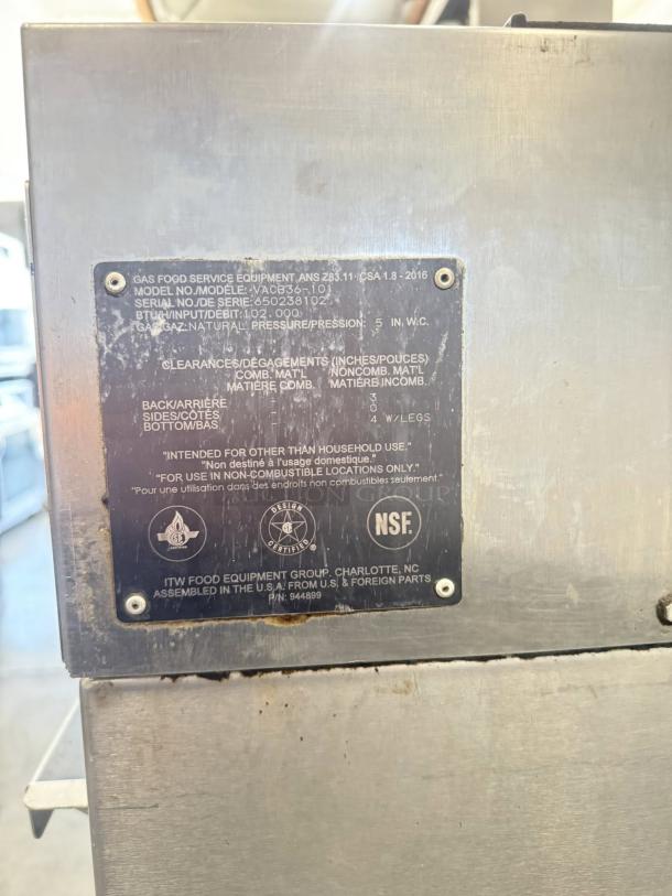 Vulcan VACB36 36" radiant charbroiler with cast iron grates, natural gas model, featuring a metal label indicating specs and certifications.