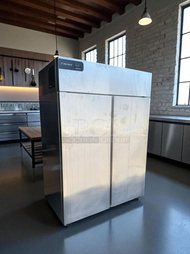 Delfield GAR2P-S two-section reach-in refrigerator, solid doors, 115v tested, stainless steel, excellent condition.
