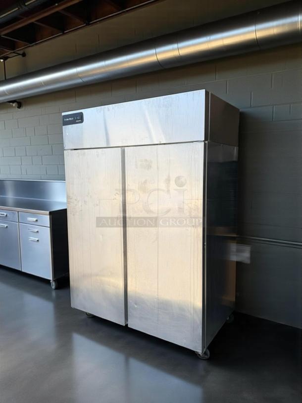 Delfield GAR2P-S two-section reach-in refrigerator, 55 2/9", solid doors, 115v, stainless steel, tested and working.
