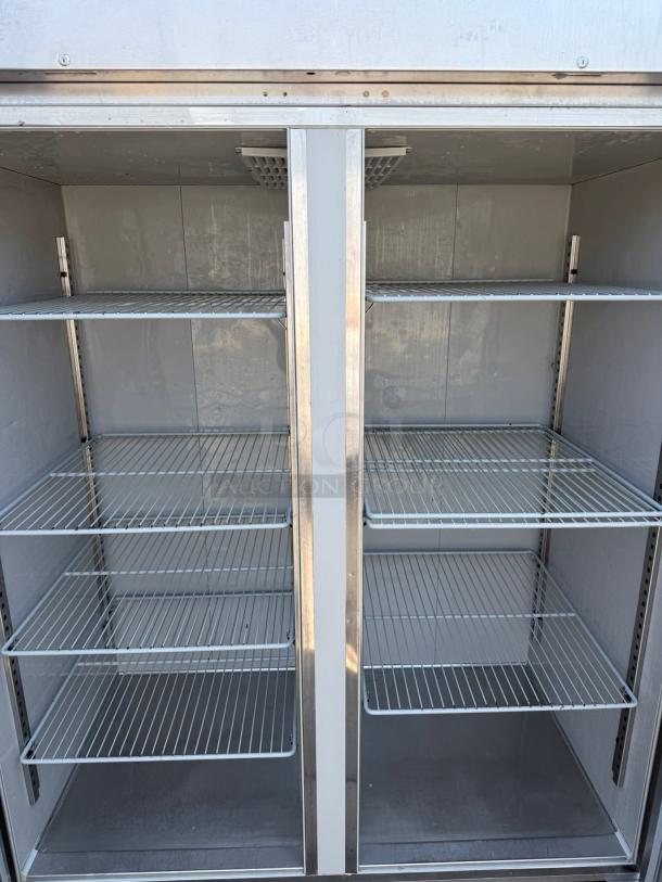 Delfield GAR2P-S two-section reach-in refrigerator, tested and working. Solid metal doors, adjustable shelves, 115v, excellent condition.