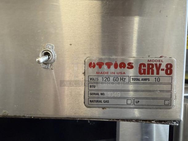 Attias GRY-4 Gyro & Shawarma Machine, 4 burners, 1 spit, tested, working, stainless steel, model label showing voltage and amps.
