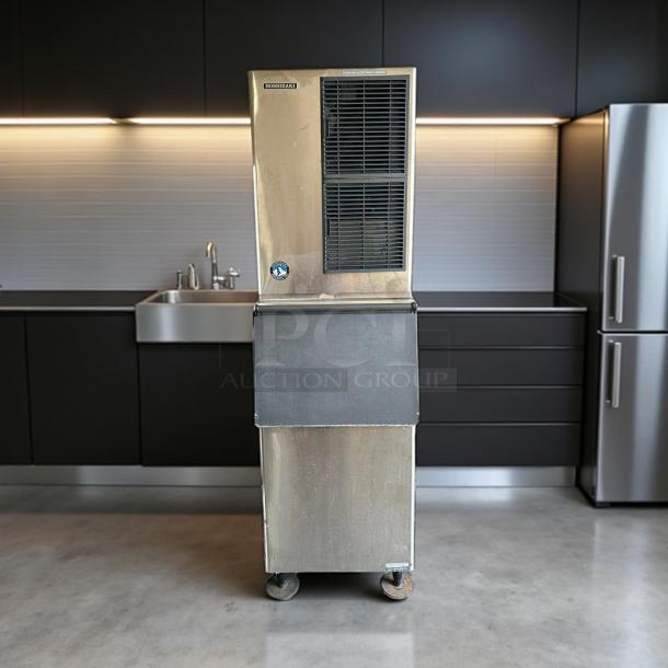 Hoshizaki KM-500MAH crescent cube ice machine with 300 lb. storage on wheels. Tested, working, 115V. Stainless steel finish.