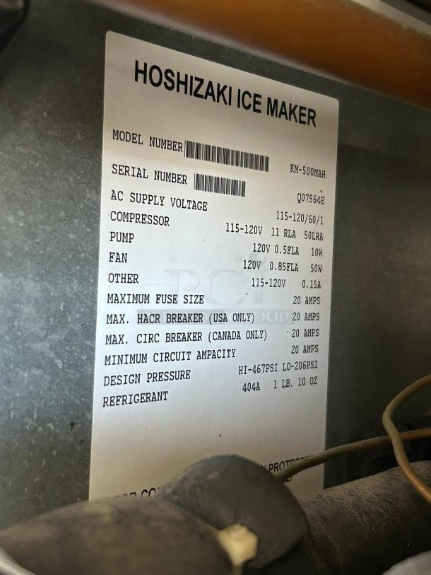 Hoshizaki KM-500MAH Crescent Cube Ice Machine label detailing model, serial number, voltage, and refrigerant info.