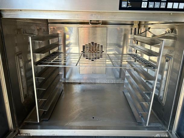 MIWE aero e+ EC 8.1826 electric convection baking oven, interior view. Stainless steel, racks, tested, 208V 3PH.
