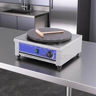Italy Model HE-1E electric crepe maker, 17.7" round plate, 115v, tested and working, in great condition, on a metal surface.