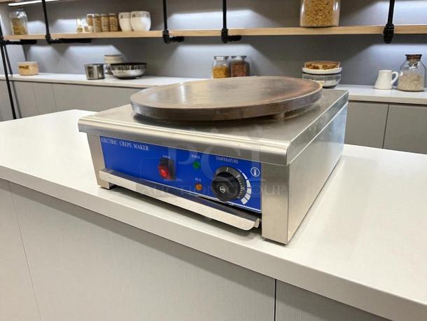 Italy Model HE-1E 17.7" Electric Crepe Maker, stainless steel, tested, great condition, 115v. Power and heat controls visible.
