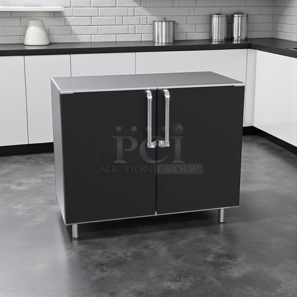 Krowne BR48 48" non-refrigerated back bar cabinet, perfect condition, 2 solid black doors, tested and working.