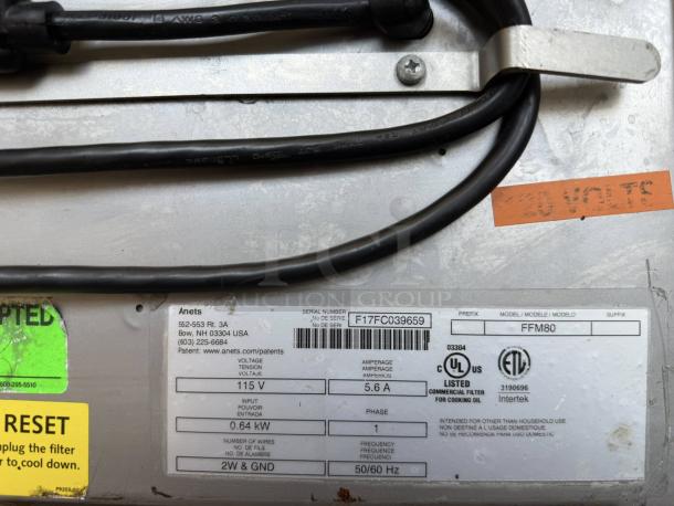Anets FFM80 commercial fryer filter, 80 lb capacity, 120v, tested and working, includes labels showing voltage and manufacturer details.