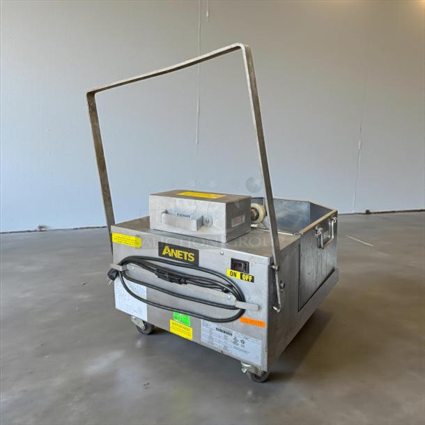 Anets FFM80 80 lb commercial fryer filter, stainless steel, on/off switch visible. In great condition, tested and working.