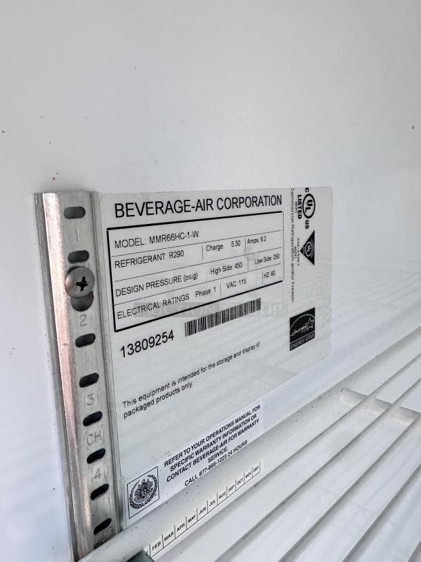 Beverage Air model MMR66HC-1-W label showing specifications: R290 refrigerant, 115V, 6.2 amps, for refrigerated merchandiser.