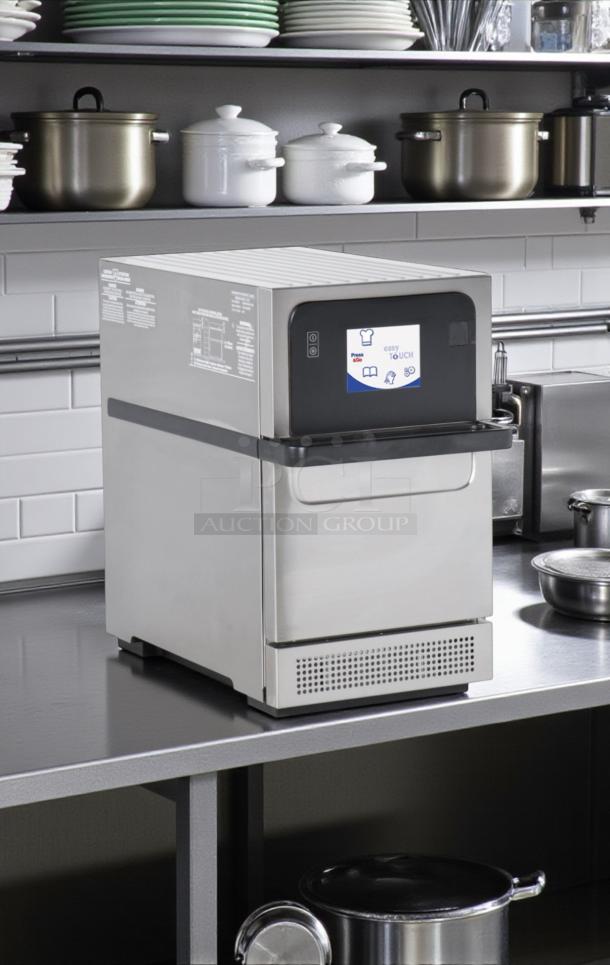 Merrychef Eikon e2s high-speed countertop oven, 208/240V, ventless, tested and working, great condition, stainless steel.
