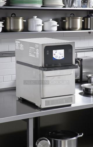 Merrychef Eikon e2s high-speed countertop oven, 208/240V, ventless, tested and working, great condition, stainless steel.