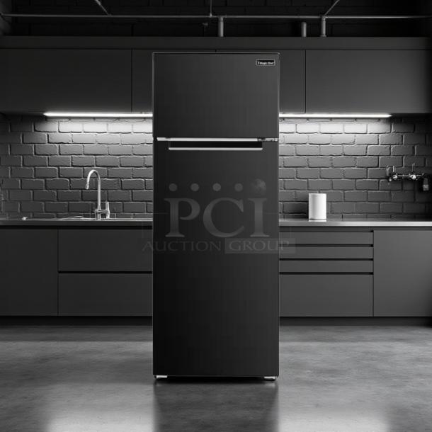 Magic Chef 7.3 cu. ft. black mini fridge with freezer, good condition, tested and working. Two-door, 115v.