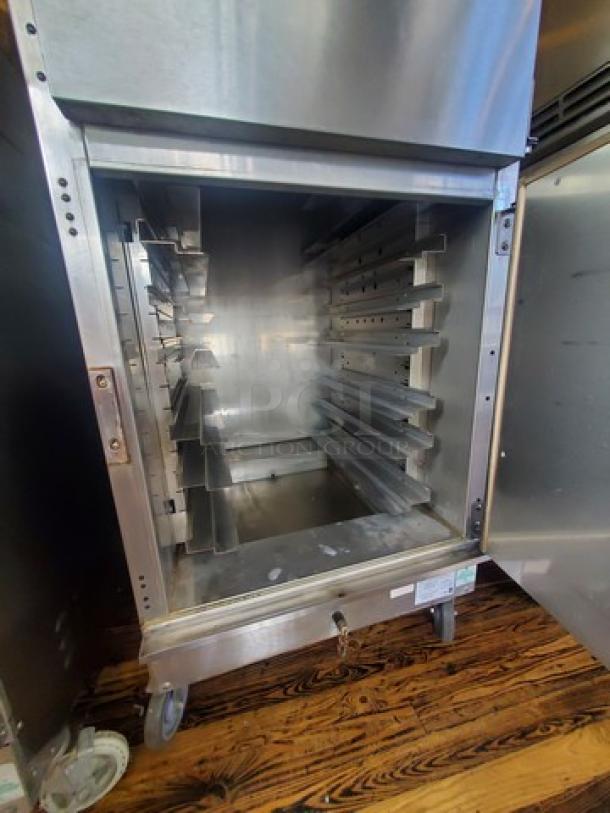 Winston Industries CVAP Holding Cabinet 4000A-Series, model HA4522GE, stainless steel on casters, open door view.