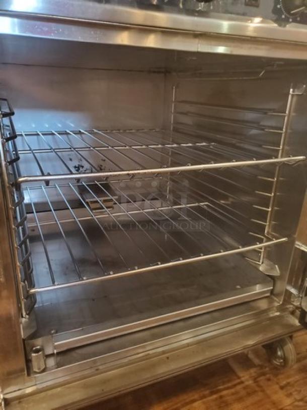Alto Shaam 767-SK Cook and Hold Smoker Oven, stainless steel, 125V, 1 PH, 60 Hz, 1920W, interior racks visible.
