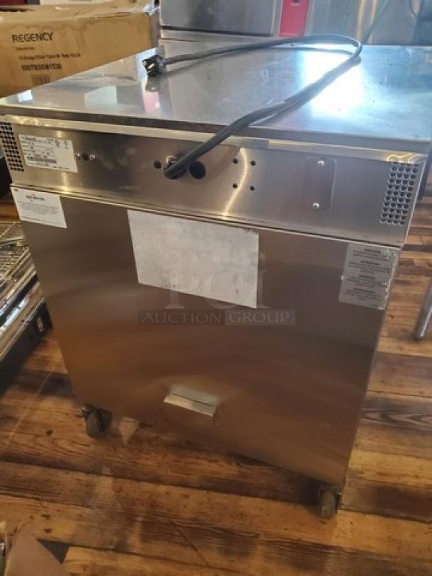 Alto Shaam model 767-SK undercounter cook and hold smoker oven, stainless steel, 125V, 1 PH, 60 Hz, 1920W, on casters.