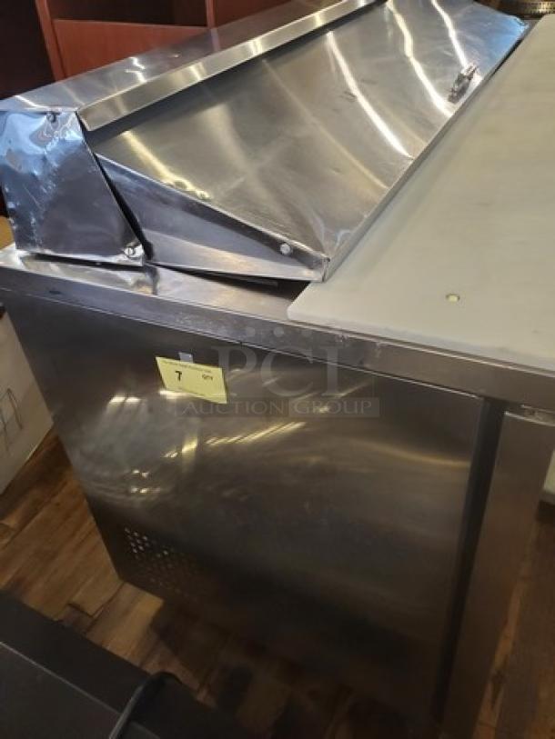 True TSSU-72-16 72" Sandwich/Salad Prep Table, stainless steel, 1/2 HP, needs new casters.
