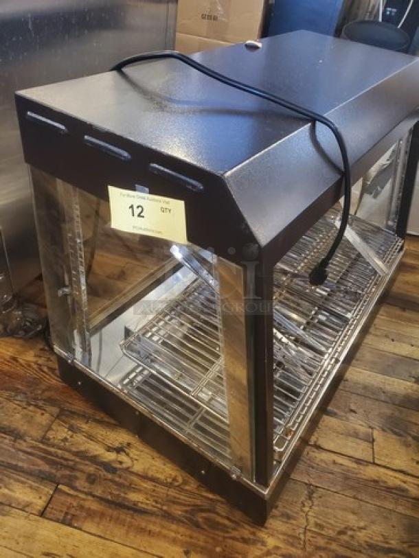 Vollrath FMA7036 Hot Food Cabinet, 120V, 1440W, 12.5A, 60 Hz, 1 PH. Features glass doors, shelving, good condition.