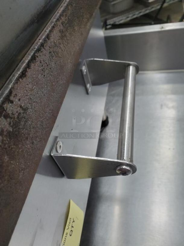 Pro-Max GR14I 14"x14" two-sided smooth grill, one handle missing, visible signs of wear, metal construction.
