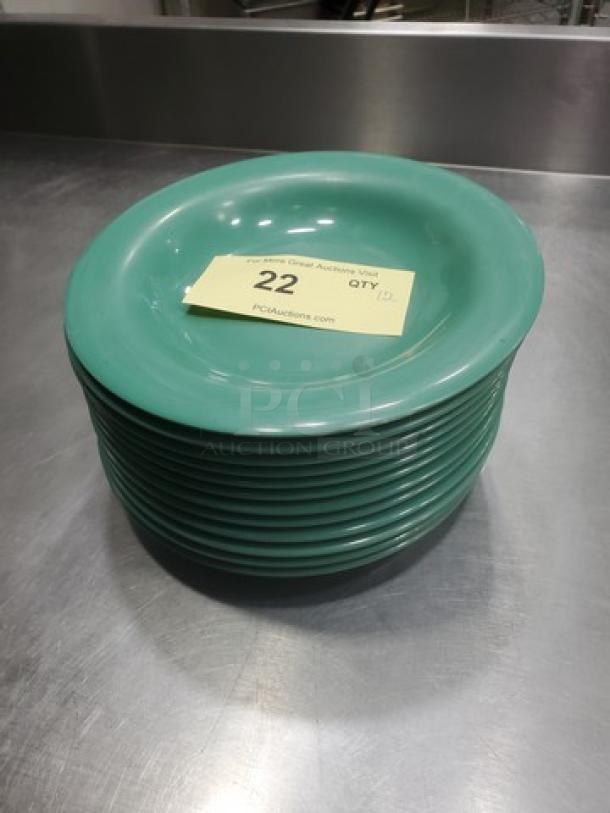 Lot of 12 GET B-139 melamine plates, 9" diameter, green, stackable. Auction tag on top plate, marked "22."