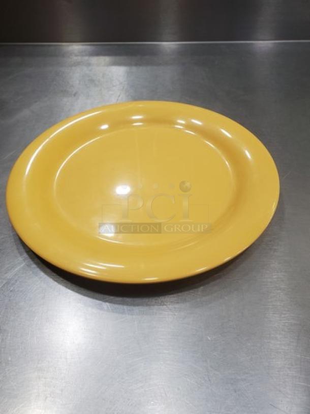 Lot of 22 GET NP-10 melamine plates, 10.5" diameter, yellow, used condition. Durable and ideal for high-volume use.