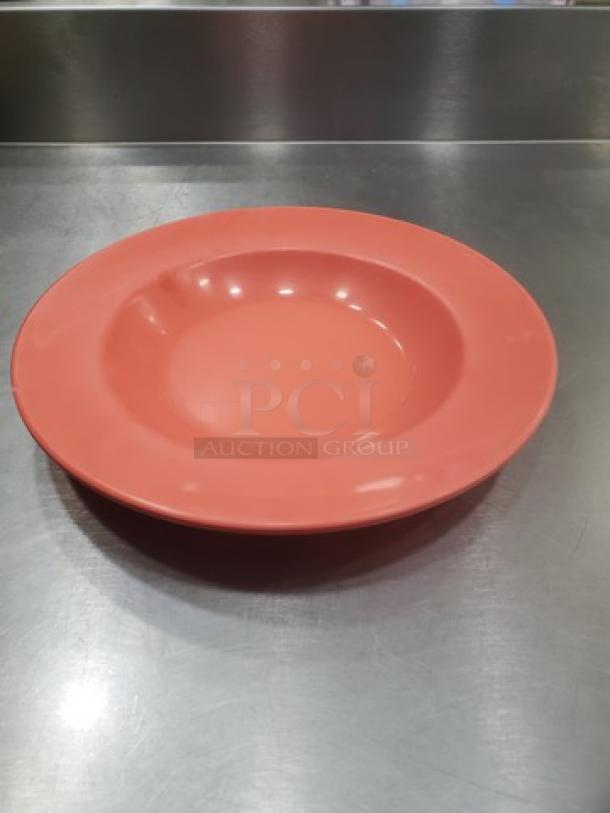 Lot of 11 GET B-1611 melamine plates, 11" diameter, coral color, durable, lightly used condition. Ideal for catering or restaurants.