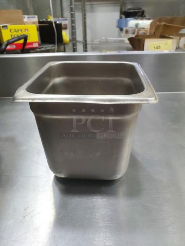 Lot of 7 stainless steel square food pans, 2.7 quarts, in good condition. Ideal for commercial kitchens.