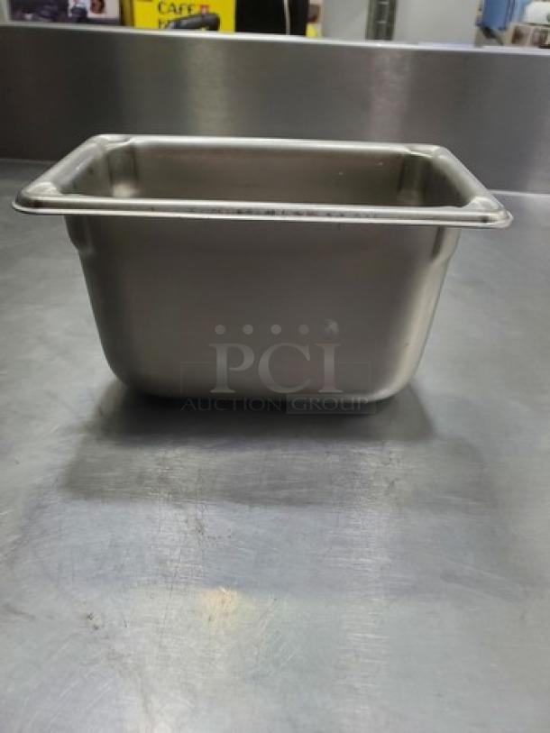 Set of 10 stainless steel food pans, 1.1 quarts each, shown in durable condition. Ideal for kitchen or catering use.