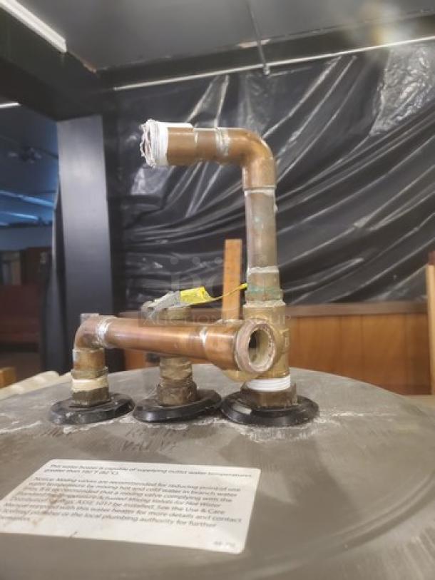 Marathon Heavy Duty 85 Gallon Non-Metallic Tall Electric Water Heater, Model MHD85245, showing top copper piping and connection points.