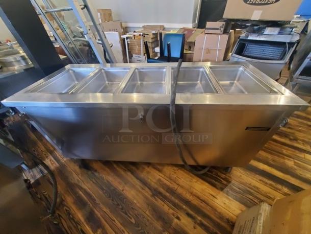 Shelley Steel by Delfield 5 well electric steam table, missing one knob, needs new plug, stainless steel finish.