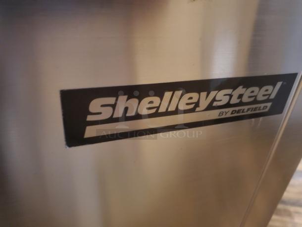 Shelley Steel by Delfield logo on stainless steel surface of 5-well electric steam table. Missing one knob, needs new plug.