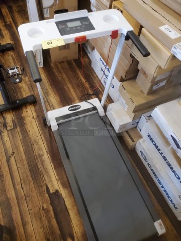 Aora Pulse Compact Treadmill, lightly used. Features include foldable design, digital display, and built-in speakers.