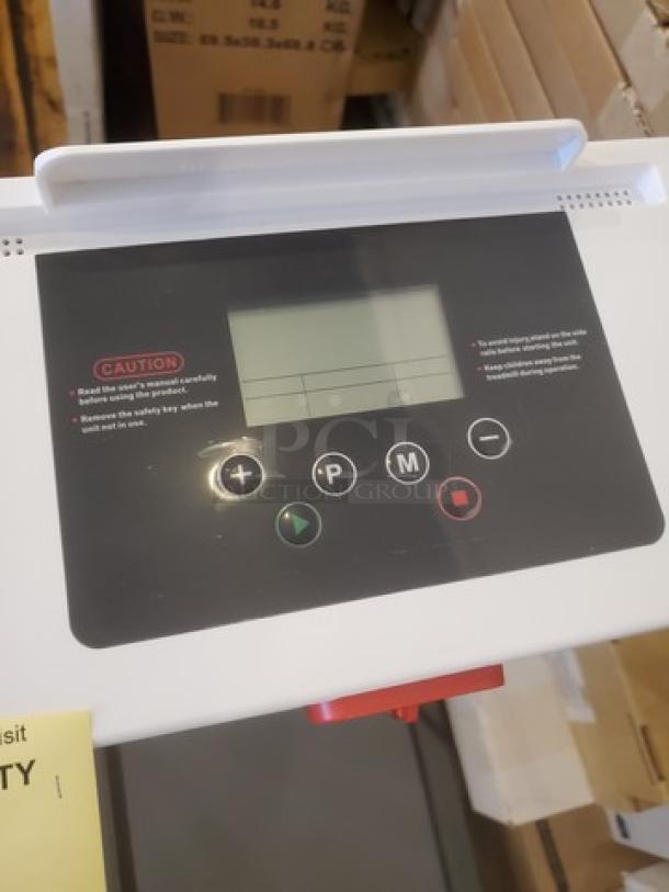 Aora Pulse Compact Treadmill control panel, featuring digital display, buttons for speed and mode adjustments, new condition.